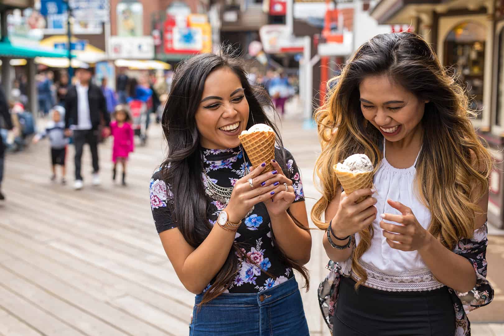 two women in their 20s enjoying ice cream together